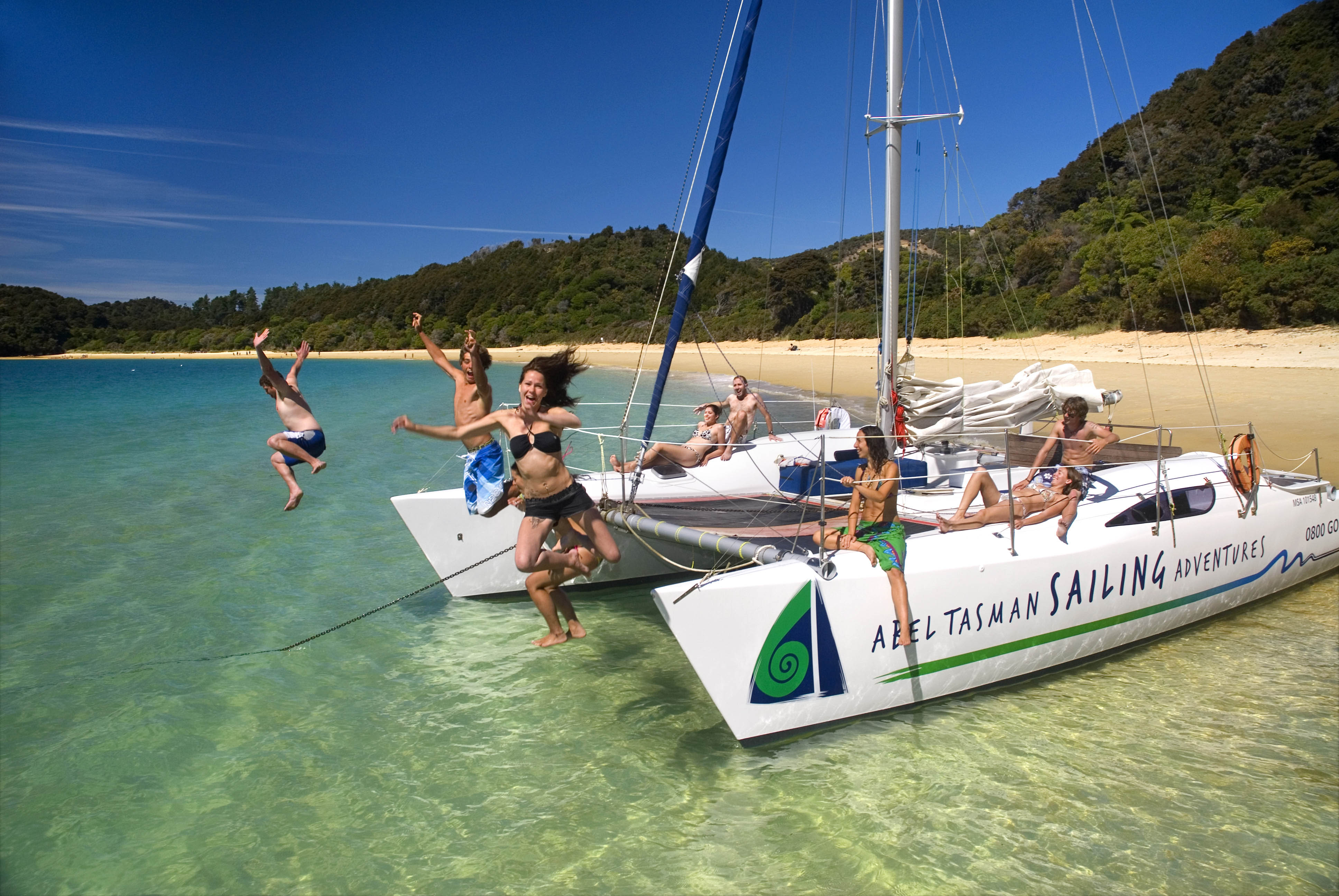 Scenic Sailing in New Zealand's Stunning Abel Tasman ...